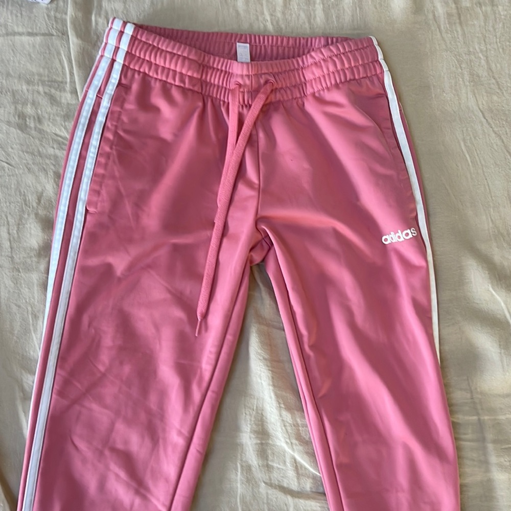 Womens pink Adidas track pants. Size S. Worn twice. Great condition